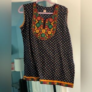 Tank top size xl. Colorful embroidery